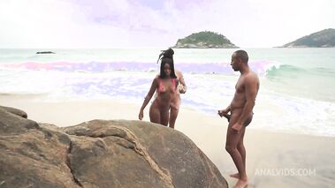 African babe having sex on a crowded beach