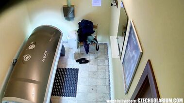 Awesome brunette with perfectly shaven pussy in tanning salon