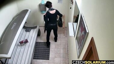 Short haired girl masturbates in tanning salon