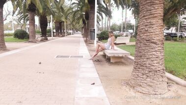 Young hottie flashing in the streets of Spain
